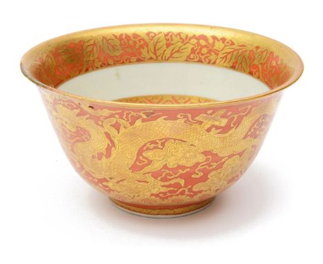 A Chinese porcelain coral ground and gilt decorated 'Kinrande' style deep bowlthe exterior decorated with two dragons chasing