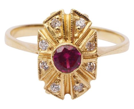 A Continental ruby and diamond set dress ringthe circular ruby surrounded by eight small diamonds in fancy mount, outer shank