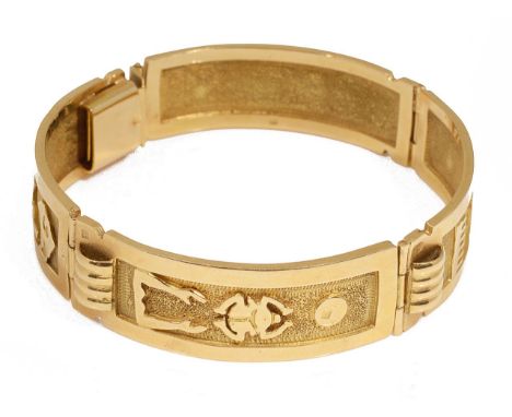 An Egyptian yellow metal hieroglyph panel braceleteach of the four panels decorated with raised hieroglyphs on a textured gro