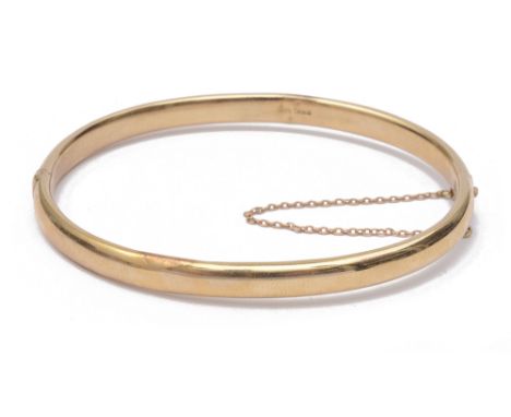 A narrow Continental yellow metal hinged banglestamped 14K and BIRKS to the inside and engraved 1909approx. 8gmCondition:  se