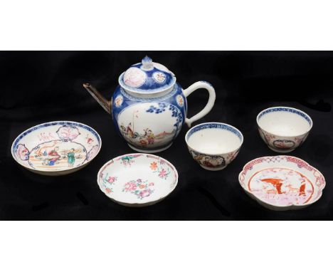 An 18th century Chinese export famille rose porcelain teapot and cover, a lobed teapot stand and tea bowls and saucersfirst o