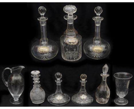 A collection of Victorian and later cut decanters and other glassto include a mallet shaped decanter with mitre cut decoratio