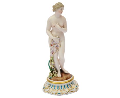 A John Bevington, Kensington Works porcelain figure of a bather in the style of Dresden c.1870modelled with flowered drapery 