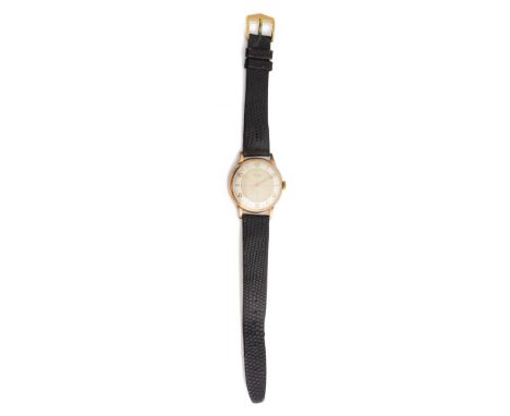 A 1950s Gentleman's 9ct gold Rotary two tone wristwatchthe 17 jewelled movement with outer silvered dial with baton and Arabi