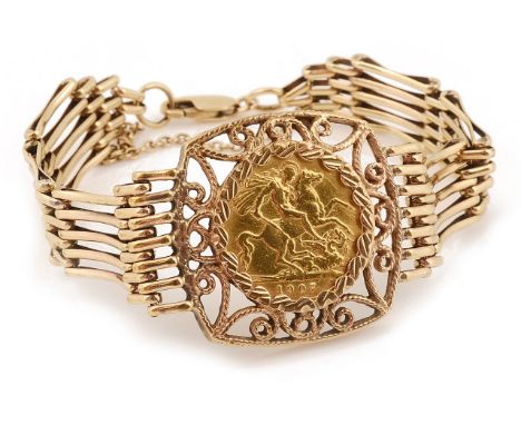 A 9ct gate bracelet with mounted half sovereignthe bracelet marked 375 on the clasp and with pierced panel with mountedtotal 