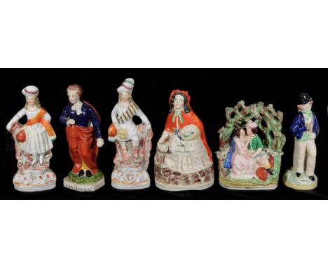 A group of 19th century and later Staffordshire flat back figures, including Red Riding Hood, a standing Lord Byron, a double