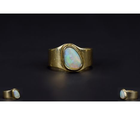 Ladies 9ct Gold and Opal Set Dress Ring the large opal of nice quality and good colour. Fully hallmarked 7 grams