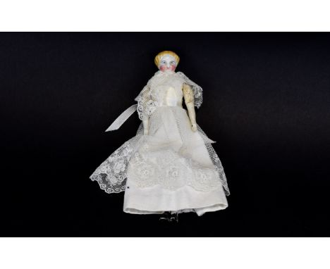 Antique Ceramic Doll Small Victorian doll with hand stitched cloth body and ceramic head half legs and arms. Painted corn blo