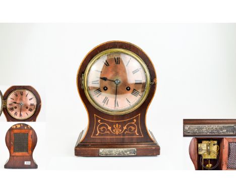 Phillip Haas & Sohne Mahogany Cased And Marquetry Inlaid Mantle Clock. Circa 1900 with 8 day striking movement. Strikes on a 