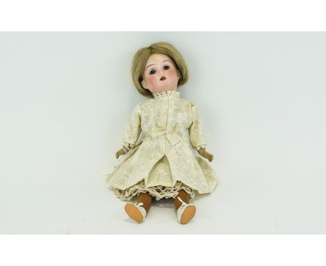 Antique German Theodor Recknagel Bisque Doll Circa 1907, marked to back of head DEP  R 7/0 A 21. Bisque socket head, painted 