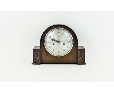 Vintage Mantle Clock Dark Wood Cased Art Deco mantle clock with brushed silver tone metal face and stylised black hands. Mark