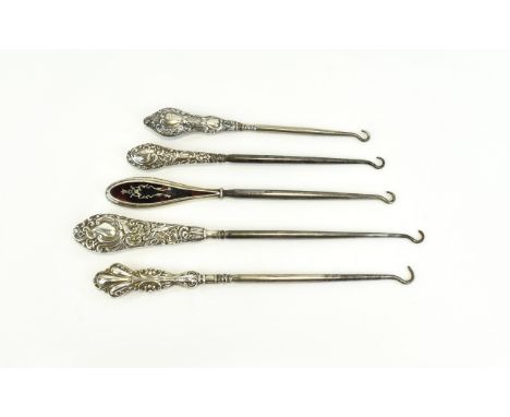Victorian And Edwardian Period Collection of Very Ornate Embossed Silver and Tortoiseshell Handle Button Hooks (5) in total. 