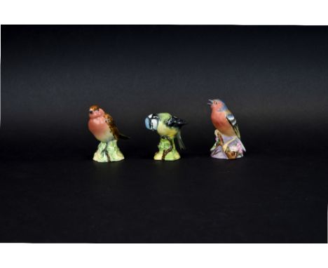 A Collection Of Beswick Ceramic Bird Figurines Three in total to include Blue Tit, Chaffinch and Robin. Approx heights,3.5 in