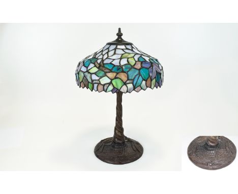 Tiffany Style Table Lamp, Leaded Shade, Embossed Cast Base Depicting Dragonflies. Height 18 Inches