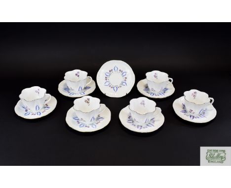 Shelley Floral Tea Cups And Saucers Seven Items in total in floral form with gilt trim. Set comprises six cups and six saucer