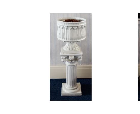 Jardiniere Large contemporary reproduction jardiniere raised on a Corinthian column with stylised foliate design and large ur