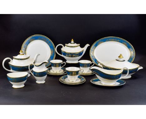 Royal Doulton Earlswood Dinner Service 70+ pieces, white ground with teal and gilt classical pattern border. Includes 4 lidde