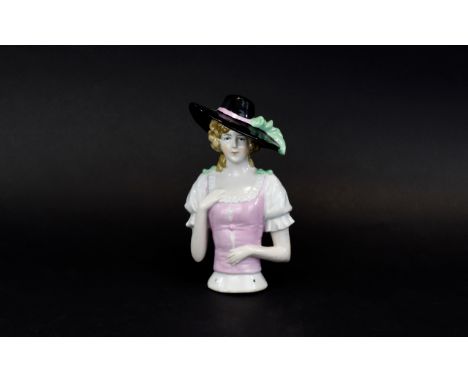 Ceramic Half Boudoir Doll Early 20th century half doll in glazed ceramic with four holes to base for attaching cloth body. An