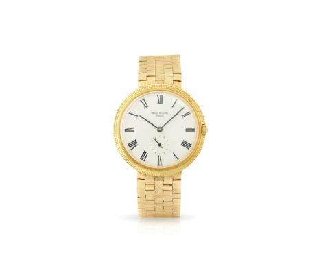  Patek Philippe. An 18k gold self-winding wristwatch on associated 14k gold bracelet Ref.3542, Movement No.1114932, Case No.3