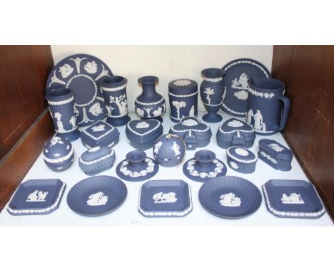 SECTION 2.  A large quantity of Wedgwood dark blue Jasperware including plates, vases, trinket boxes, pin dishes, candlestick