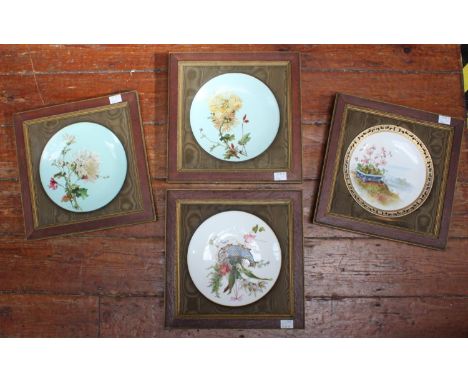 A Mintons ceramic cabinet plate decorated with a hand-painted study of flowers in a planter, with gilded rim, together with a