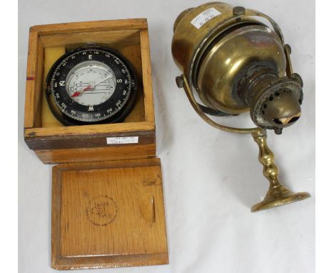 A Silva ship's compass approx. 10cm diam, in fitted wooden case, together with a brass ship's wall-mounted gimbal oil lamp (l