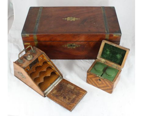 A Victorian walnut and brass-bound writing slope with black gilt-tooled leather scribe and two glass inkwells, approx. 50cm w