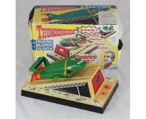 A boxed novelty Thunderbirds Talking Alarm Clock by Wesco, modelled with Thunderbird 2, 20cm 