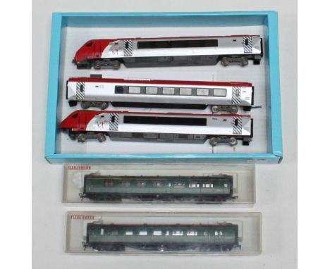 Two boxed Fleischmann carriages 5148 &amp; 5147, together with a Bachmann Virgin Trains three car set 60417, 60317 &amp; 6071