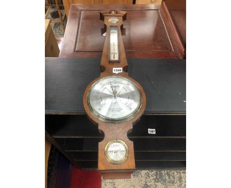 A small barometer by Comitti.