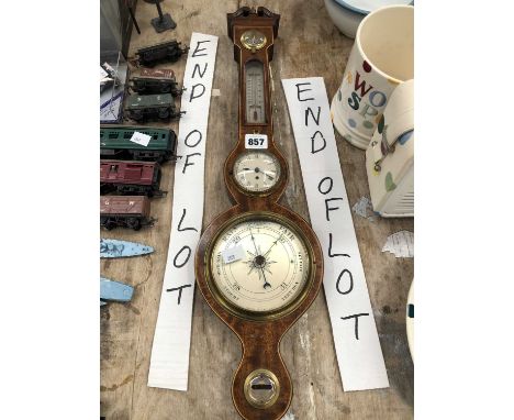 A mahogany cased banjo aneroid barometer combined with a clock and thermometer