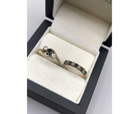 Two 9ct hallmarked gold sapphire and diamond dress rings. Half eternity size L, three stone twist size R. Gross weight 3.2 gr