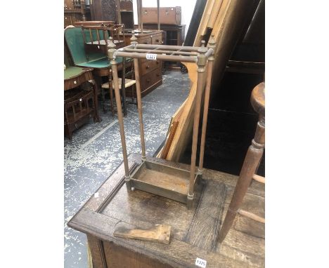 A brass and iron stick stand. 