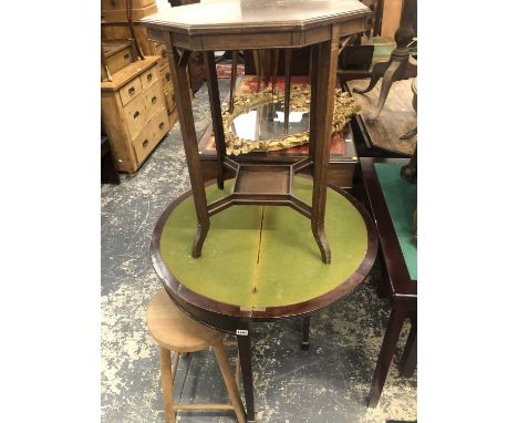 A small foldover card table.