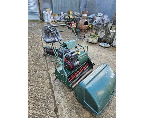 ATCO petrol mower, 30in cut complete with ride on seat and roller