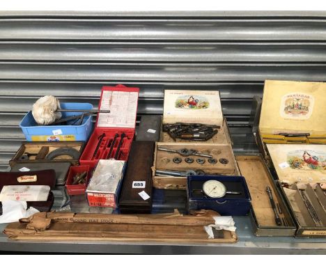 Various taps, dies and other tools.