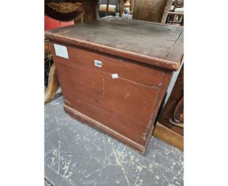 A large pine commode box.