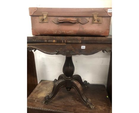 A Victorian rosewood card table.