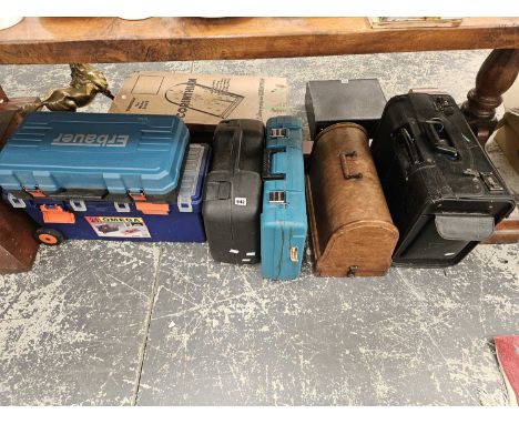 Black &amp; Decker and Makita cased drills, an Omega tool box with some tools and two other tool boxes, a sewing machine and 
