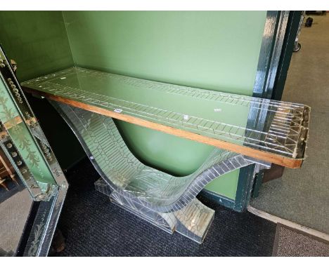 A large mirrored console table. H 77 W 140 D 40 cm