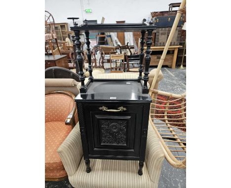 An Edwardian ebonised coal box with a raised shelf over. 