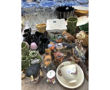 Ceramic bird figures, drinking glass, a cuckoo clock, vases, etc.