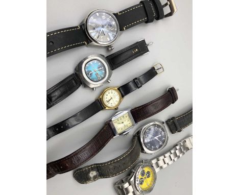 A collection of wristwatches, including a Seiko chronograph yellow dial, vintage Citizen Automatic, Fossil, Siro, Roamer, and
