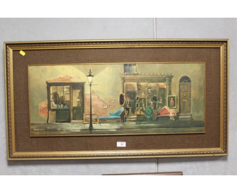 A VINTAGE FRAMED AND MOUNTED PRINT OF AN ANTIQUE SHOP