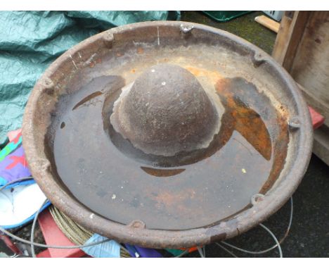 A MEXICAN HAT SHAPED PIG TROUGH