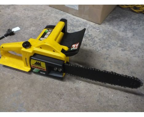 AN ELECTRIC CHAINSAW
