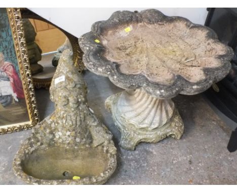 A CLAM SHELL EFFECT BIRD BATH TOGETHER WITH A GNOME PLANTER