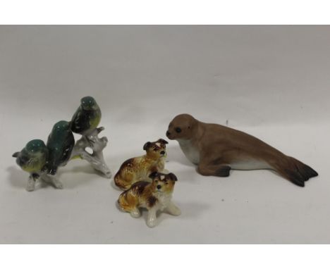 AN AYNSLEY CERAMIC FIGURE OF A SEAL TOGETHER WITH TWO GOEBEL DOG FIGURES PLUS ANOTHER (4)