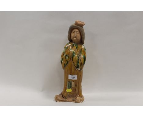 AN ORIENTAL GLAZED CERAMIC FIGURE OF A LADY