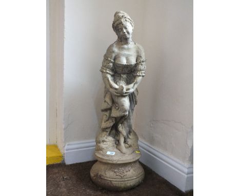 A FIGURATIVE GARDEN ORNAMENT OF A LADY WITH A BIRD